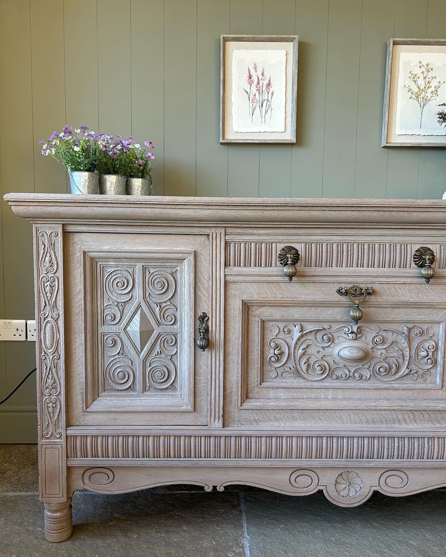 Large Vintage Weathered Oak Sideboard with Swirl Carvings and Brass Handles. Maple and Co.