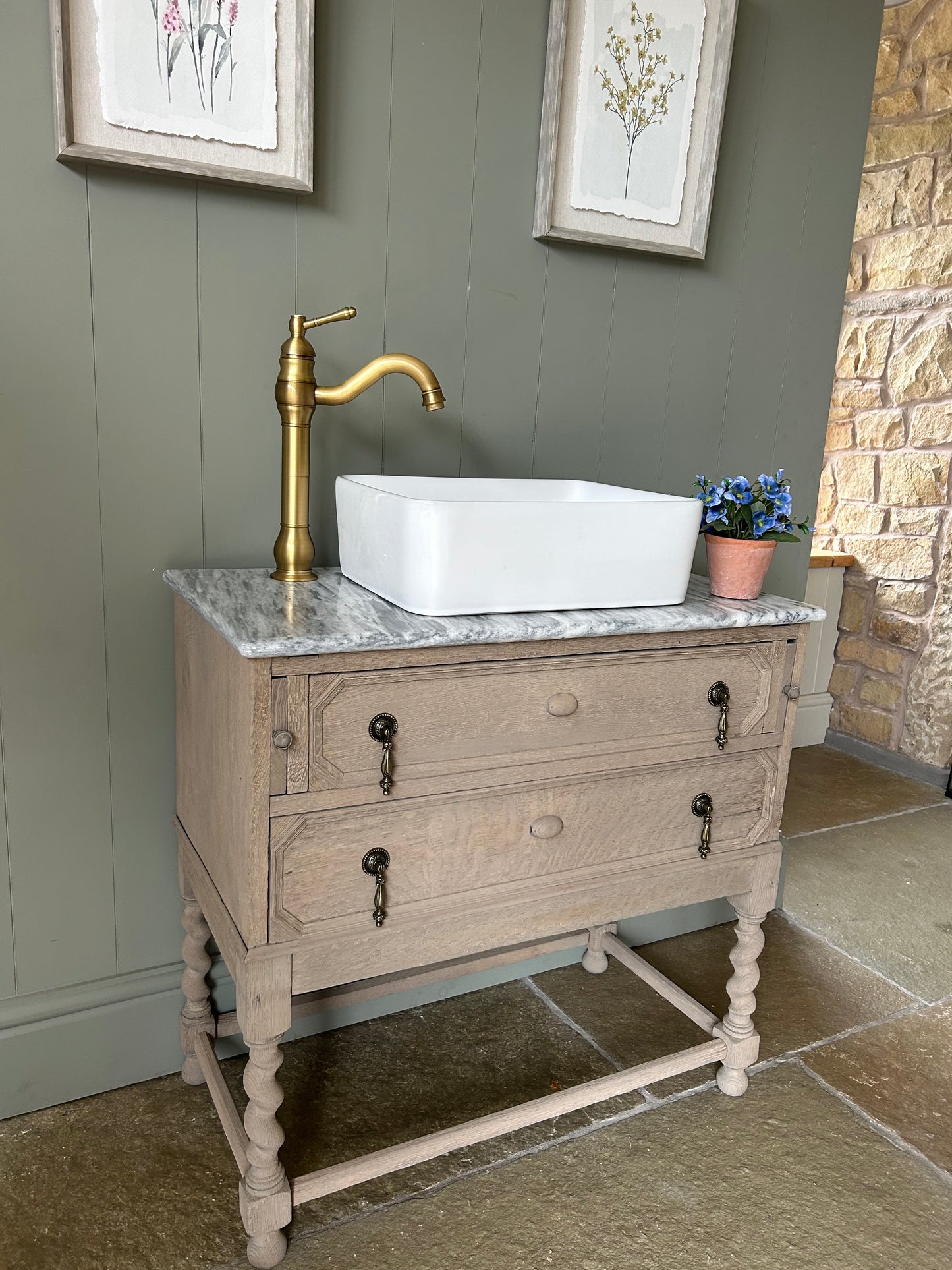 Vintage Marble Top Vanity Sink finished in a weathered oak style.
