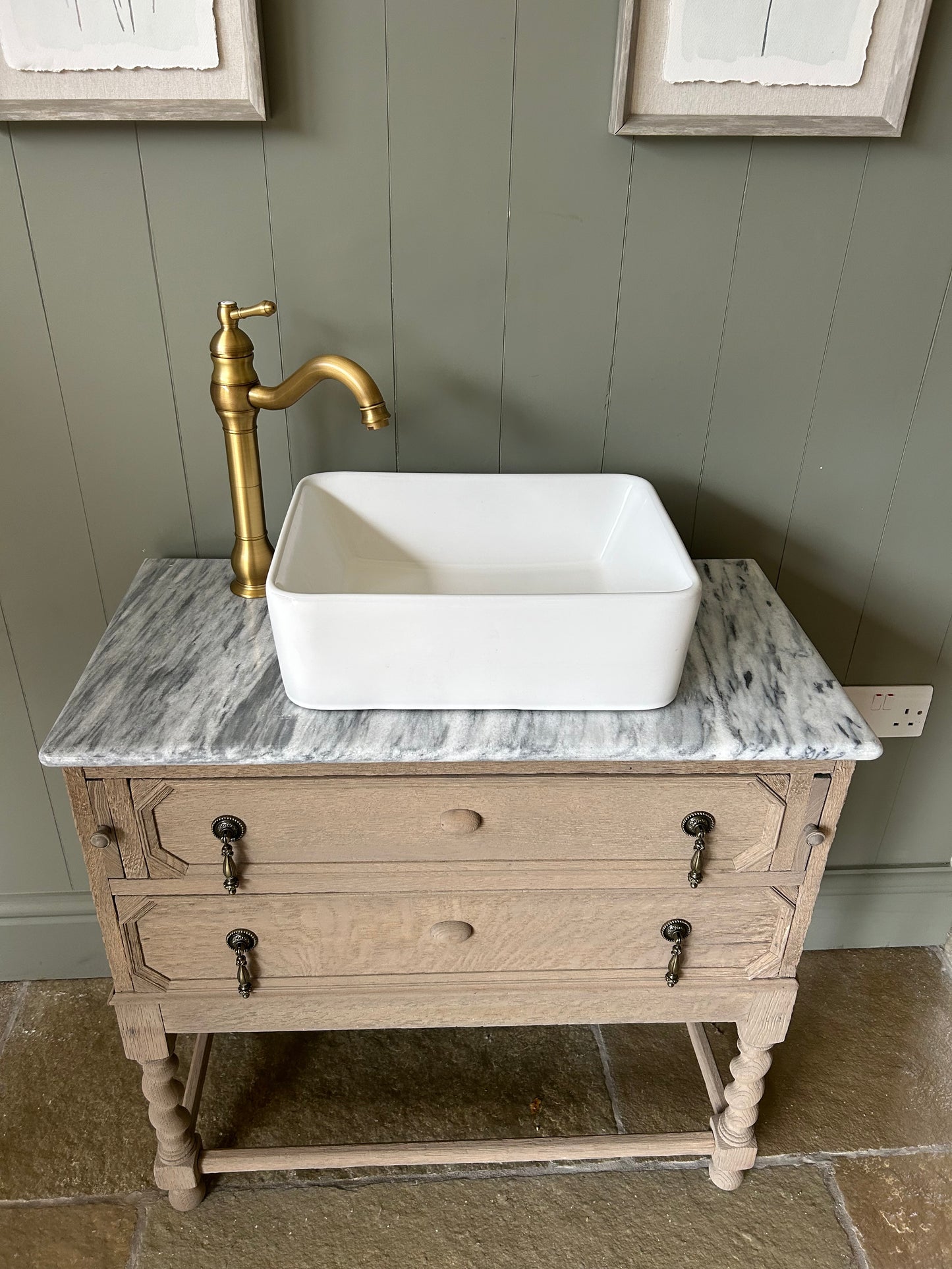 Vintage Marble Top Vanity Sink finished in a weathered oak style.