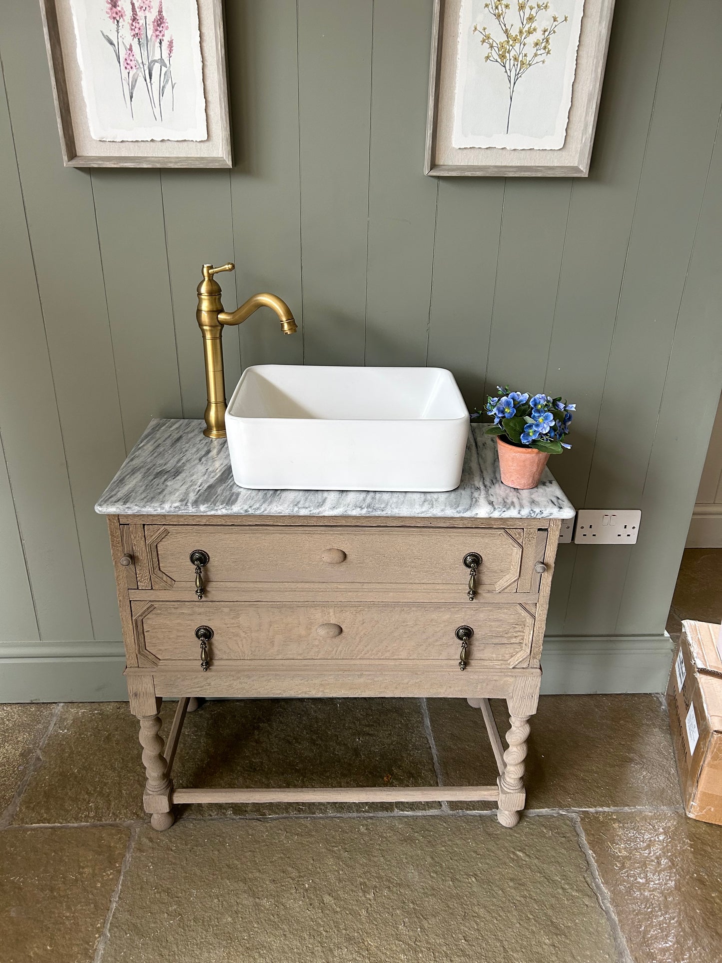 Vintage Marble Top Vanity Sink finished in a weathered oak style.