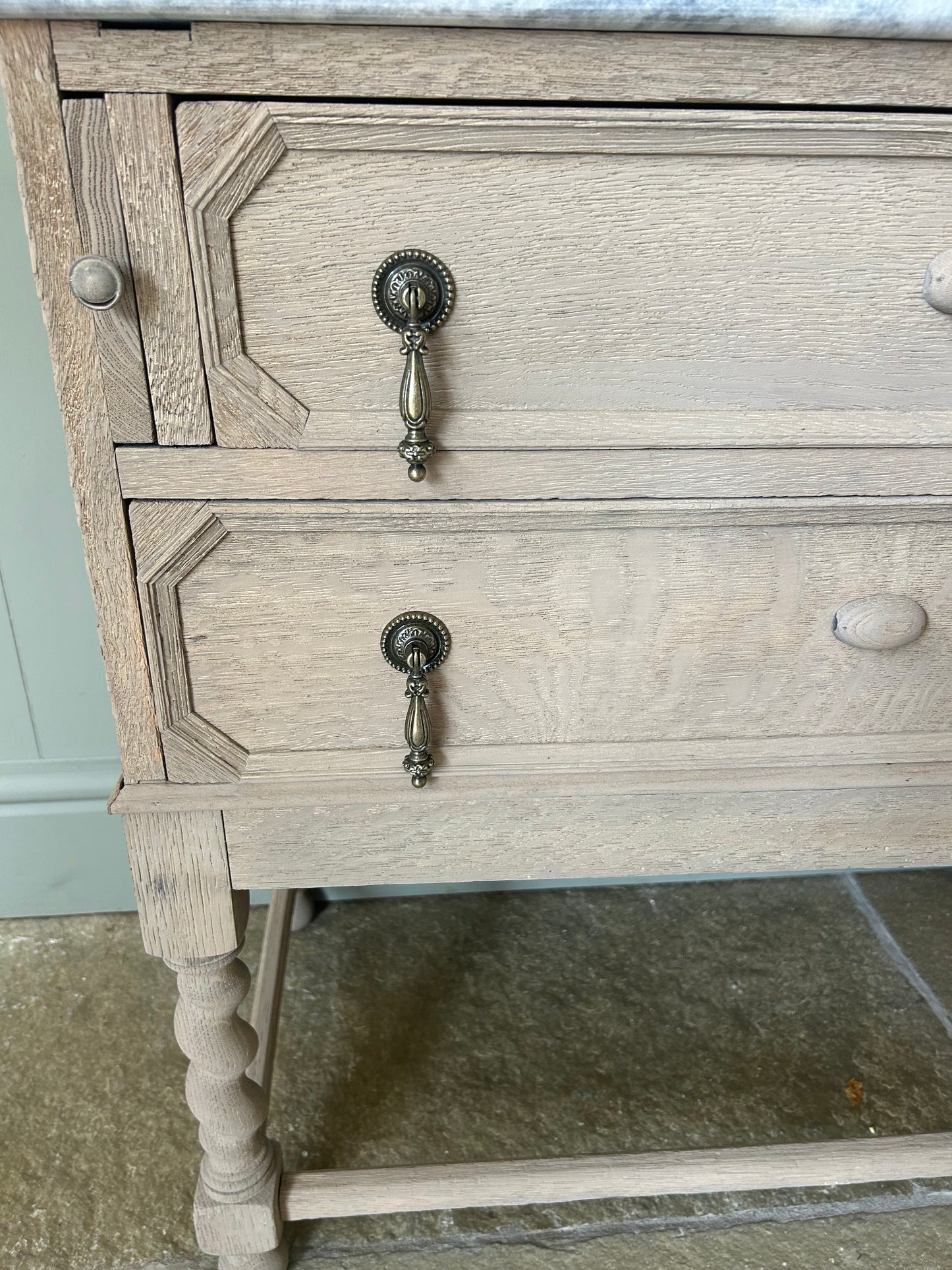 Vintage Marble Top Vanity Sink finished in a weathered oak style.