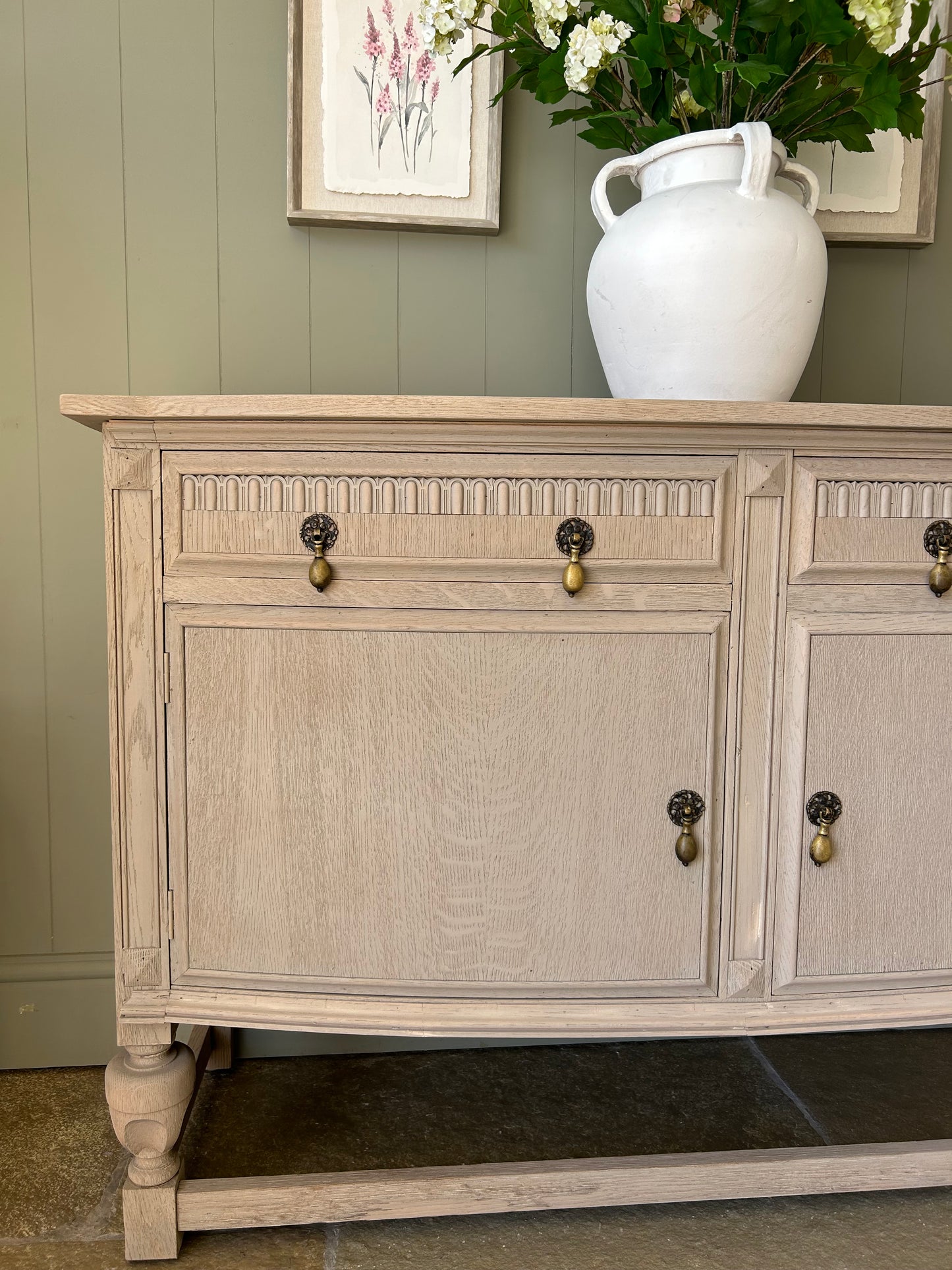 Vintage Bow Fronted sideboard finished in a weathered oak style.