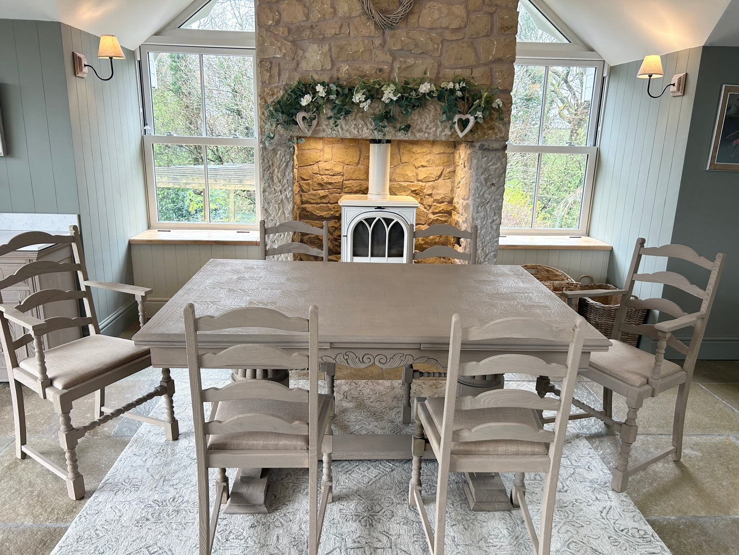 Extra Large Extending 280cm Solid Oak Dining Table with 8 chairs Set finished in a Weathered Oak style.