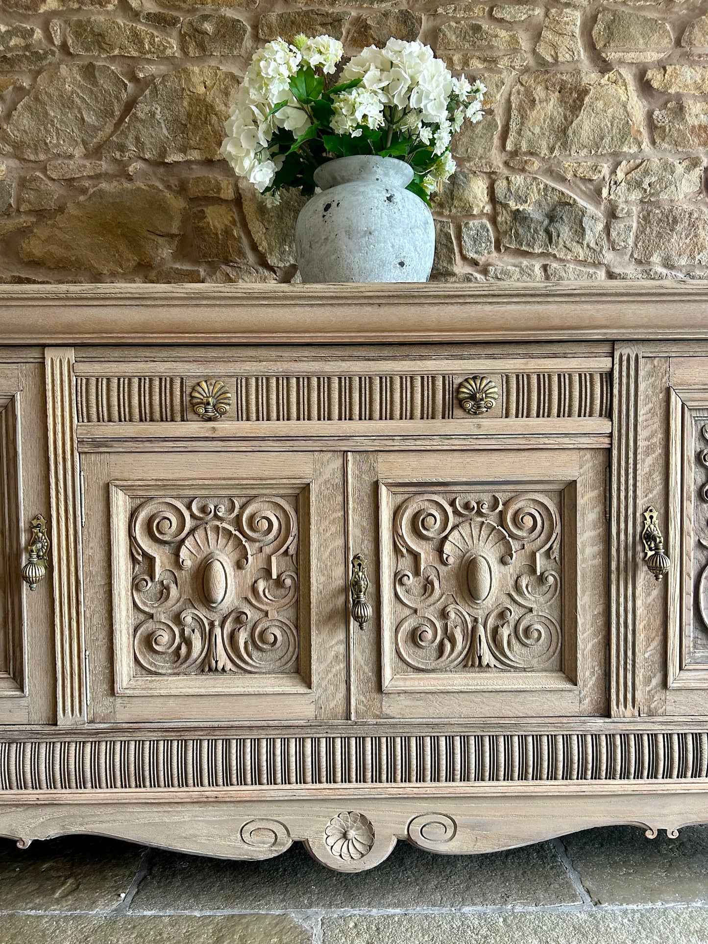 Extra Large Ornate Solid Oak Sideboard finished in a light weathered oak finish.