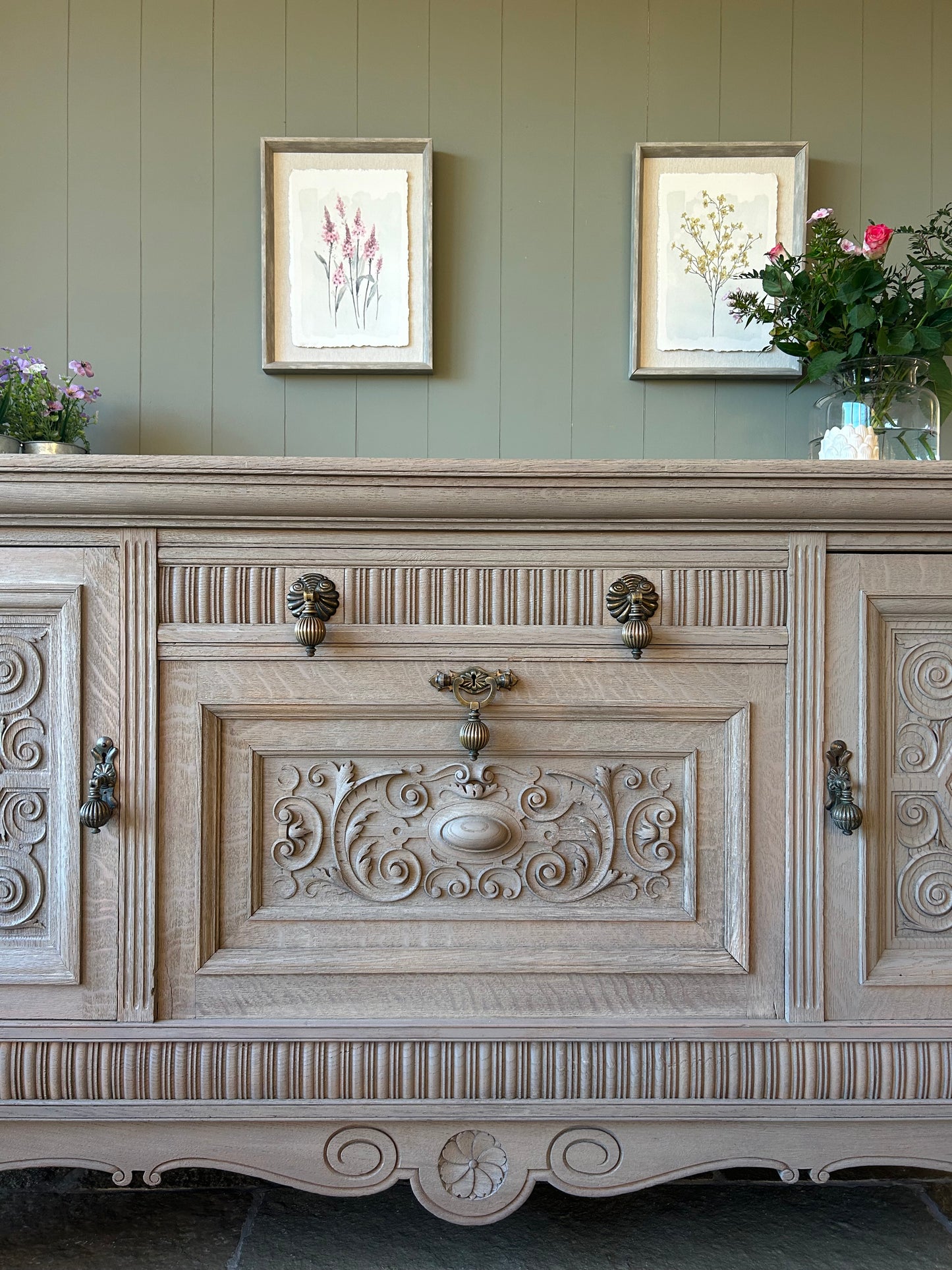 Large Vintage Weathered Oak Sideboard with Swirl Carvings and Brass Handles. Maple and Co.