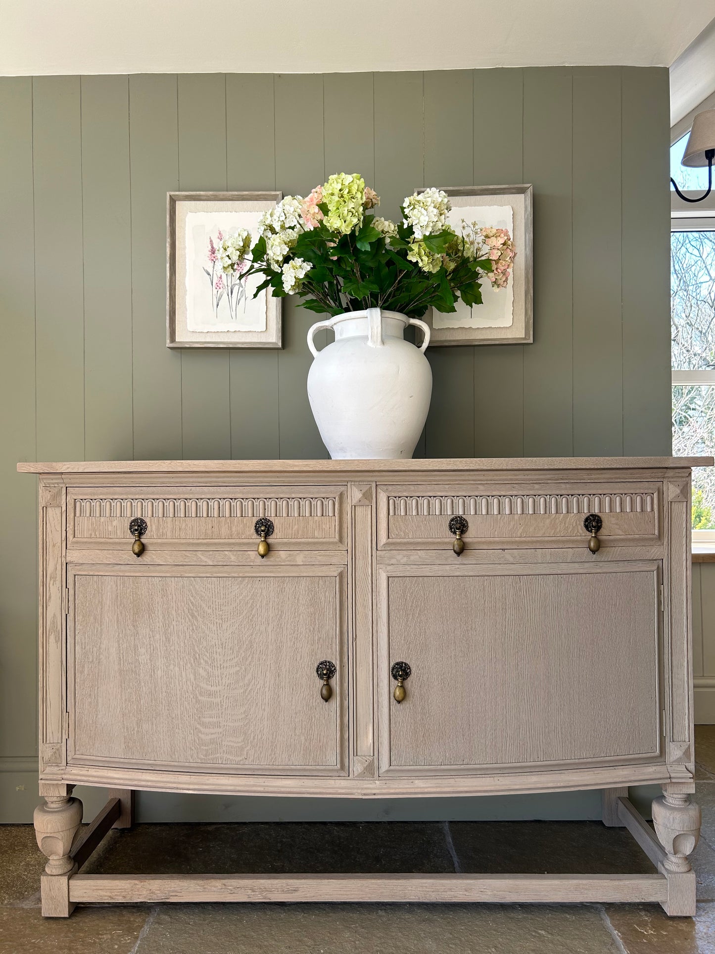 Vintage Bow Fronted sideboard finished in a weathered oak style.