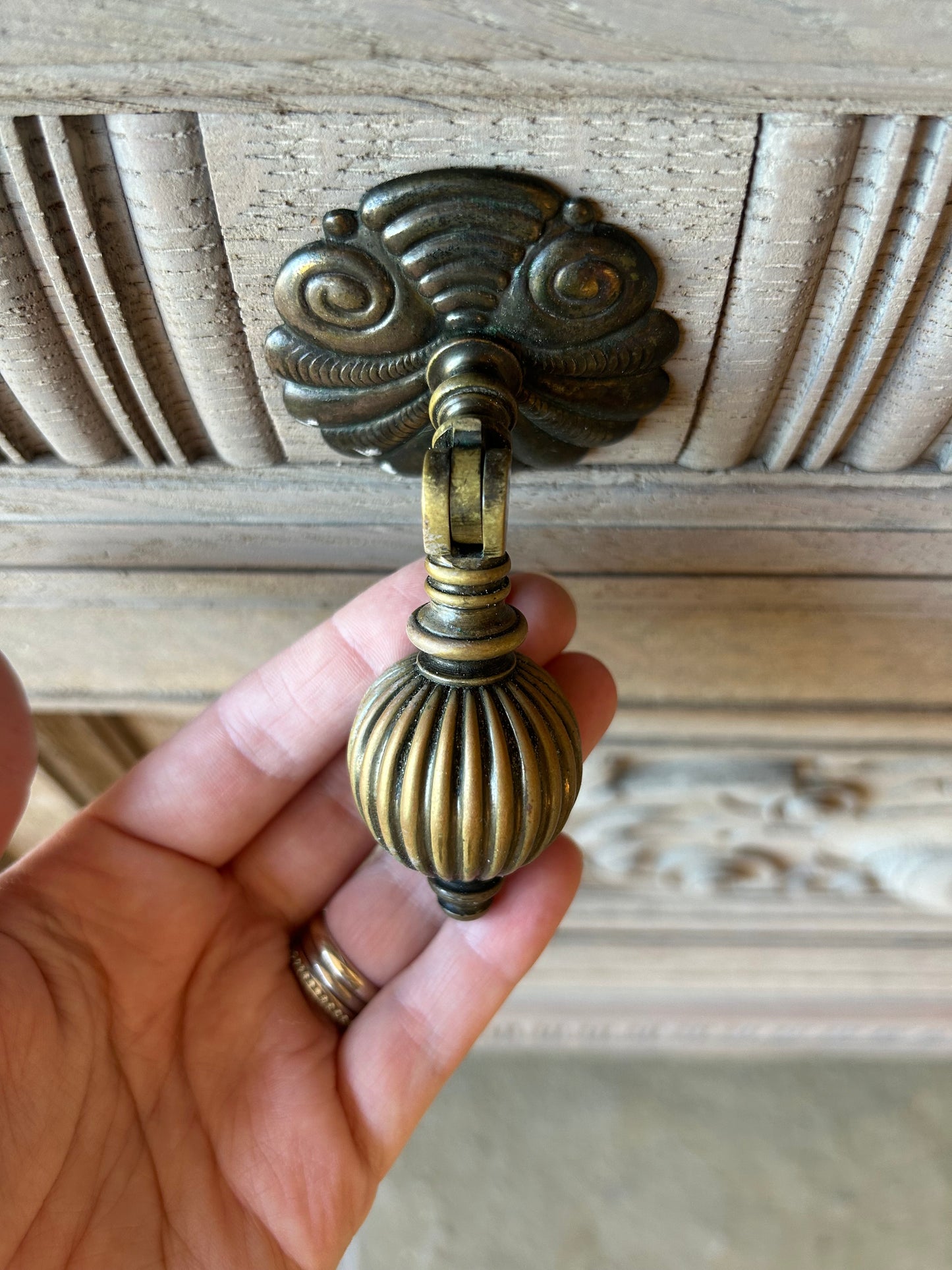 Large Vintage Weathered Oak Sideboard with Swirl Carvings and Brass Handles. Maple and Co.