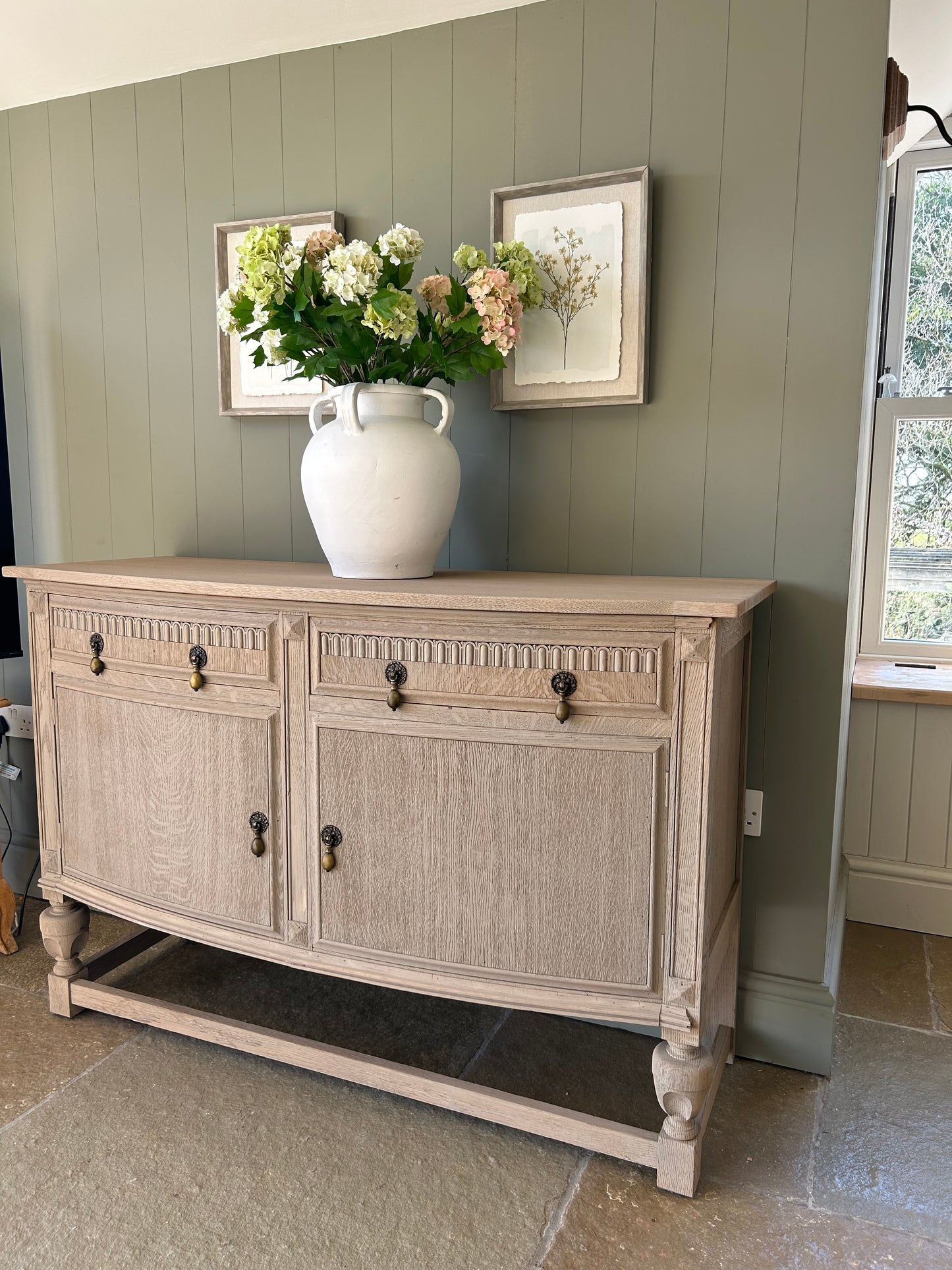 Vintage Bow Fronted sideboard finished in a weathered oak style.