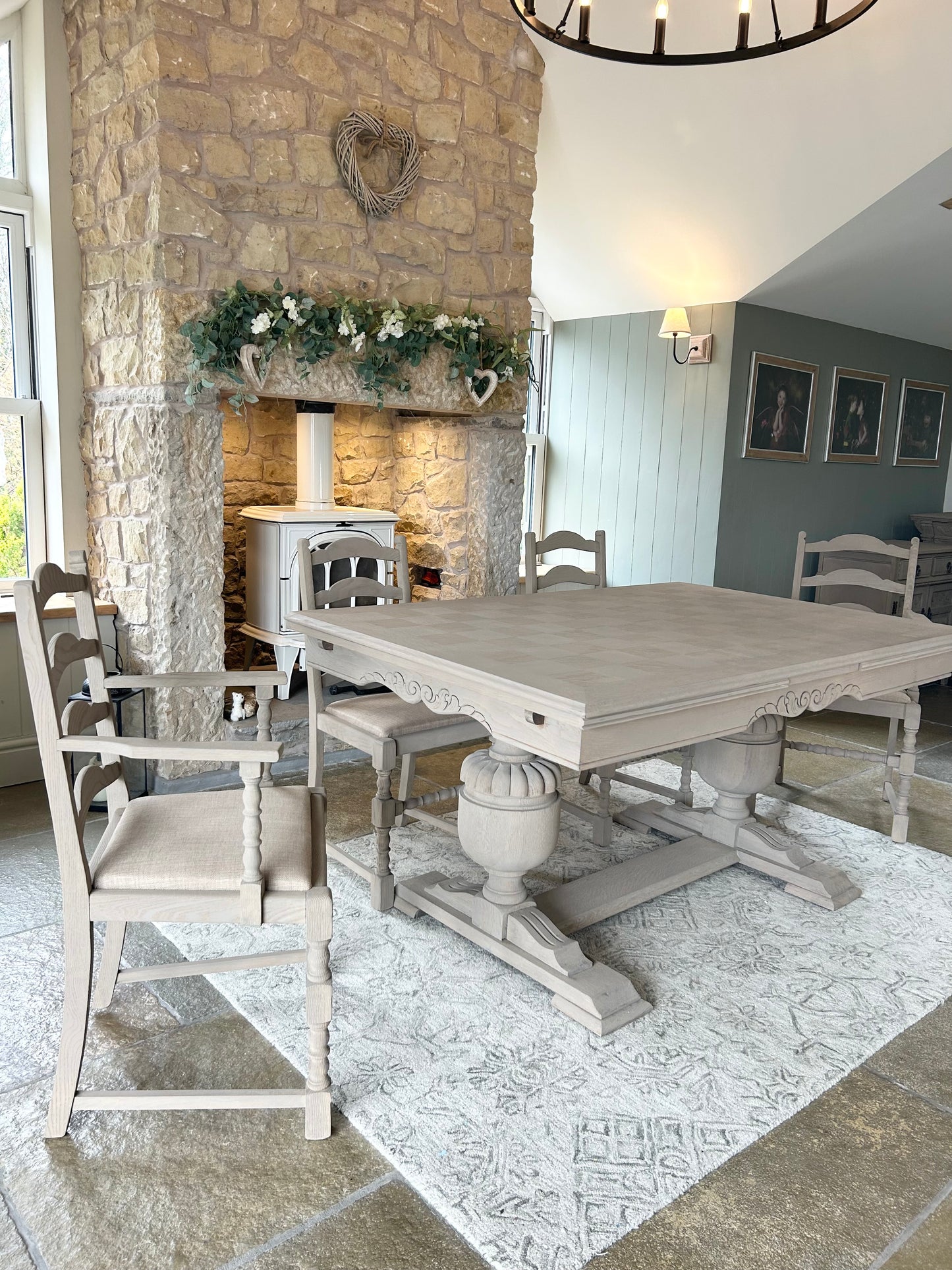 Extra Large Extending 280cm Solid Oak Dining Table with 8 chairs Set finished in a Weathered Oak style.