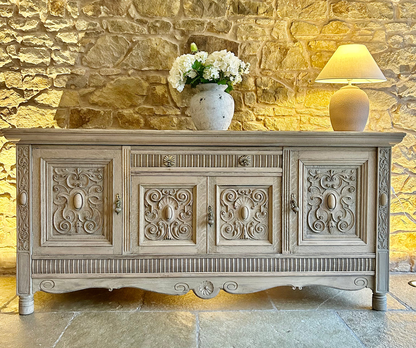 Extra Large Ornate Solid Oak Sideboard finished in a light weathered oak finish.