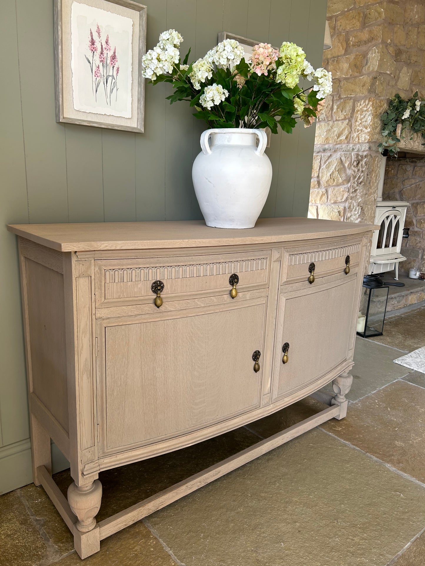 Vintage Bow Fronted sideboard finished in a weathered oak style.