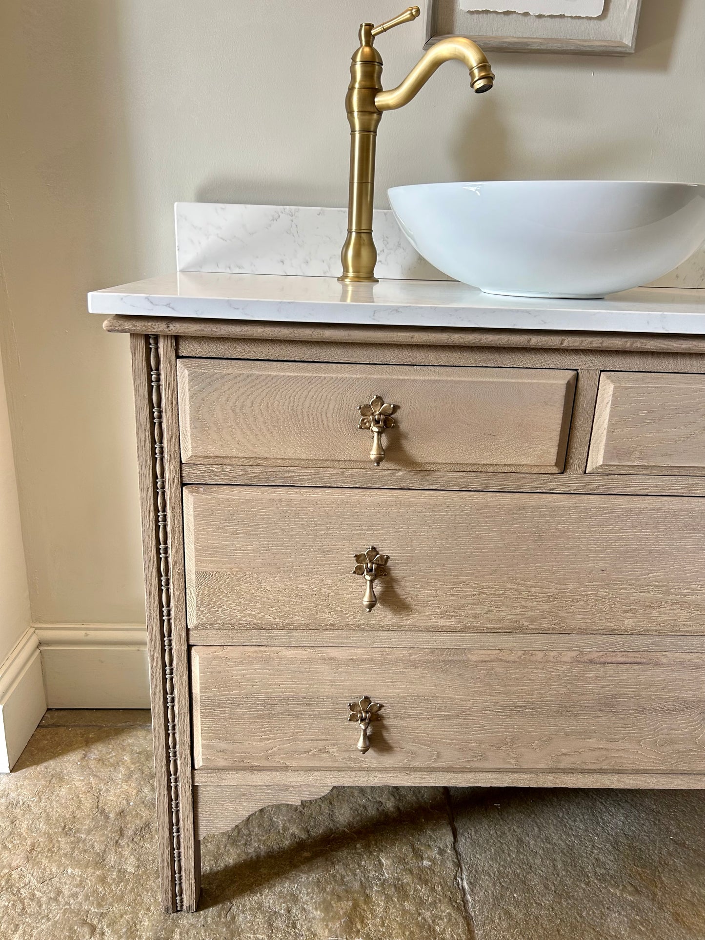 Large Single Vanity Sink finished in a light weathered oak style. Marble/quartz top and Upstand. 100.5 cm wide