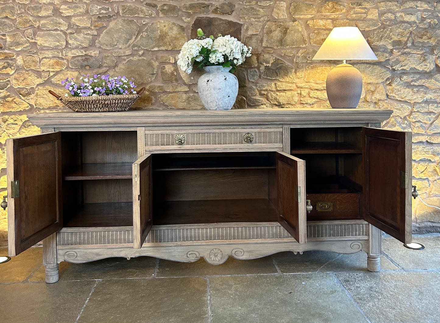 Extra Large Ornate Solid Oak Sideboard finished in a light weathered oak finish.