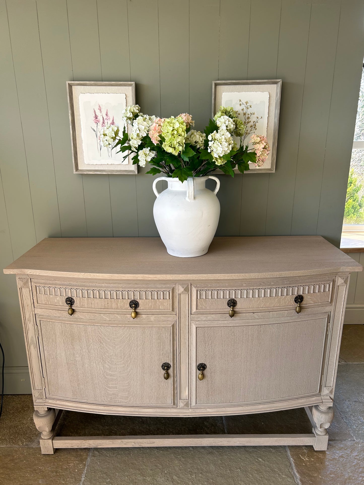 Vintage Bow Fronted sideboard finished in a weathered oak style.